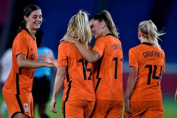 Lieke Martens of the Netherlands celebrates with Kika van Es of the Netherlands after scoring her sides fourth goal during the Tokyo 2020 Olympic...