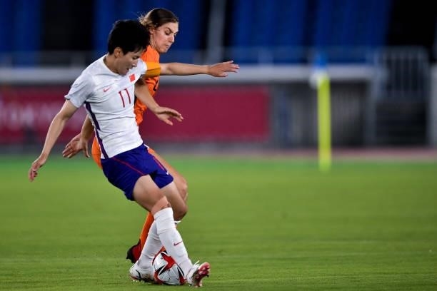 Shanshan Wang of China and Aniek Nouwen of the Netherlands during the Tokyo 2020 Olympic Womens Football Tournament match between Netherlands and...