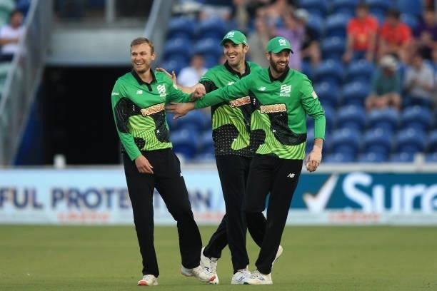 Players of Southern Brave celebrate during The Hundred match between Welsh Fire and Southern Brave at Sophia Gardens on July 27, 2021 in Cardiff,...