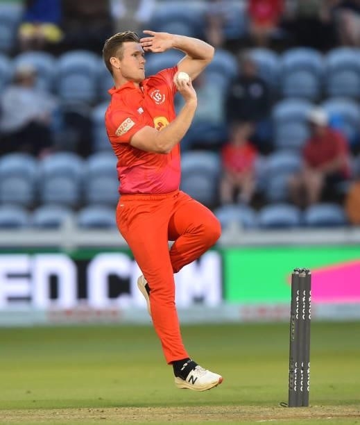 James Neesham of Welsh Fire runs into bowl during The Hundred match between Welsh Fire Men and Southern Brave Men at Sophia Gardens on July 27, 2021...