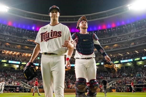 Taylor Rogers of the Minnesota Twins celebrates with Ryan Jeffers against the Los Angeles Angels on July 23, 2021 at Target Field in Minneapolis,...
