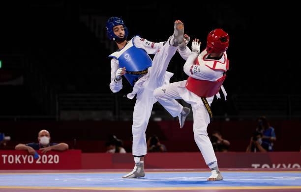 Mohamed Khalil Jendoubi of Team Tunisia competes against Vito Dell'Aquila of Team Italy during the Men's -58kg Taekwondo Gold Medal contest on day...