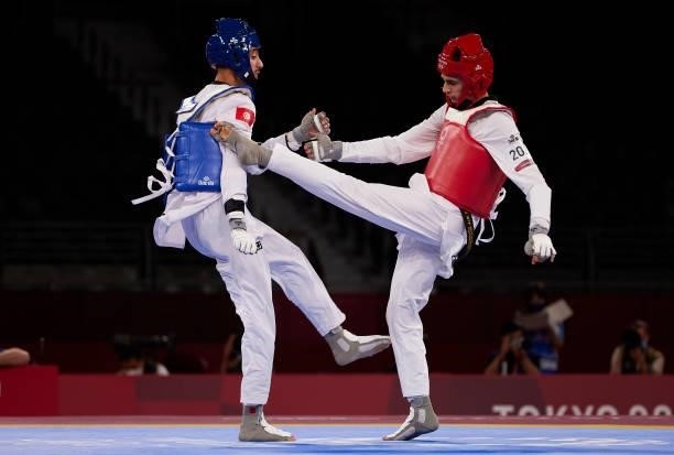 Mohamed Khalil Jendoubi of Team Tunisia competes against Vito Dell'Aquila of Team Italy during the Men's -58kg Taekwondo Gold Medal contest on day...