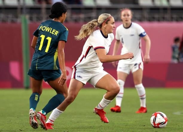 Lindsey Horan of Team United States dribbles the ball during the Women's Football Group G match against Australia on day four of the Tokyo 2020...