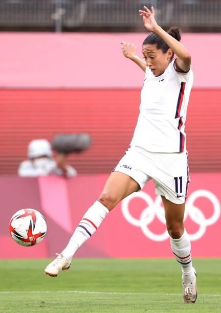 Christen Press of Team United States plays against Australia during the Women's Football Group G match on day four of the Tokyo 2020 Olympic Games at...