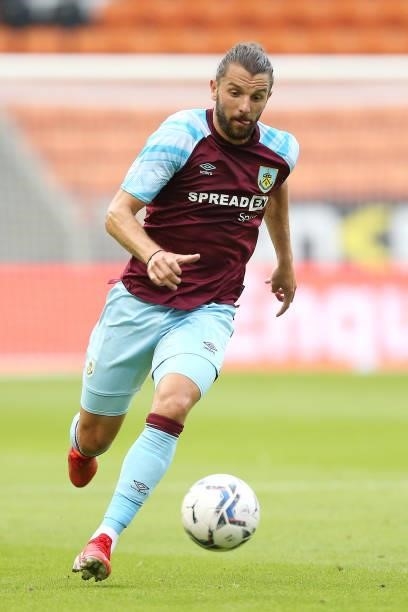 Jay Rodriguez of Burnley runs with the ball during the Pre-Season Friendly match between Blackpool and Burnley at Bloomfield Road on July 27, 2021 in...