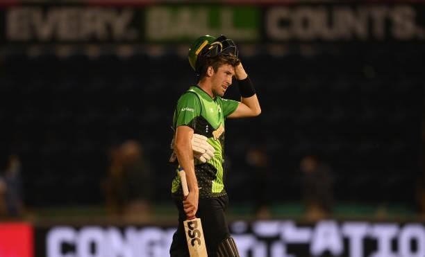 Craig Overton of Southern Brave looks on after The Hundred match between Welsh Fire and Southern Brave at Sophia Gardens on July 27, 2021 in Cardiff,...