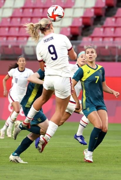 Lindsey Horan of Team United States heads the ball against Australia during the Women's Group G on day four of the Tokyo 2020 Olympic Games at...