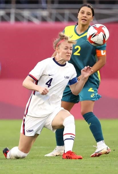 Becky Sauerbrunn of Team United States heads the ball in front of Sam Kerr of Team Australia during the Women's Group G match on day four of the...