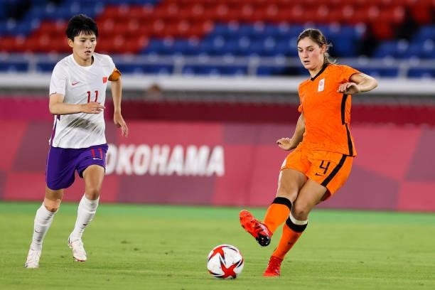 Nouwen Aniek of Netherland pass the ball in the Women's First Round match during the Tokyo 2020 Olympic Games between Netherland and China at...