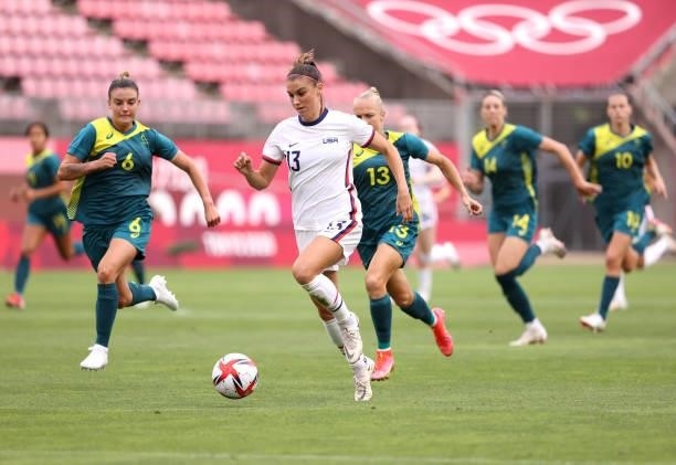 Alex Morgan of Team United States chases down the ball against Australia during the Women's Group G match on day four of the Tokyo 2020 Olympic Games...