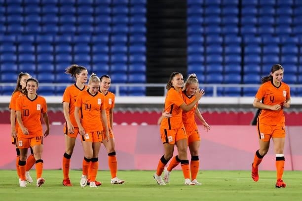 Van Es Kika of Netherland celebrates her scoring in the Women's First Round match during the Tokyo 2020 Olympic Games between Netherland and China at...