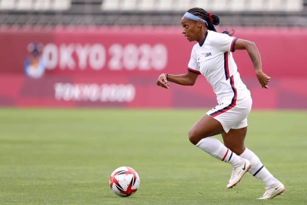 Crystal Dunn of Team United States chases down the ball while playing against Australia during the Women's Football Group G match on day four of the...