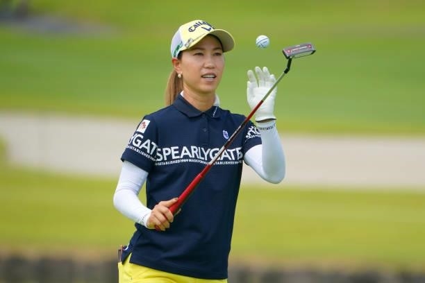 Momoko Ueda of Japan juggles the ball on the 18th green during the Pro-Am ahead of Rakuten Super Ladies at Tokyu Grand Oak Golf Club on July 28, 2021...