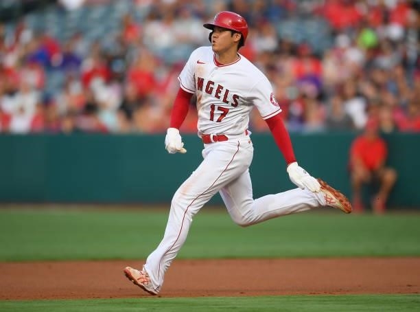 Shohei Ohtani of the Los Angeles Angels runs to second for a stolen base in the first inning of the game against the Colorado Rockies at Angel...