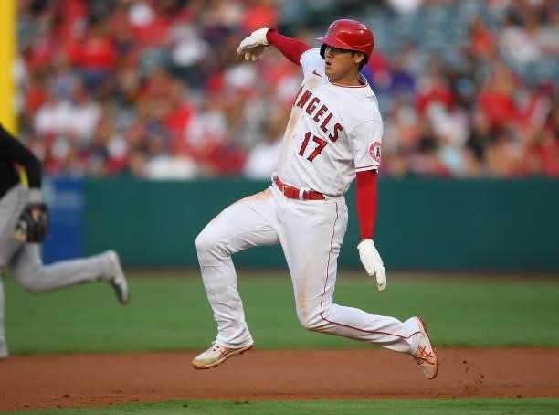 Shohei Ohtani of the Los Angeles Angels runs to second for a stolen base in the first inning of the game against the Colorado Rockies at Angel...