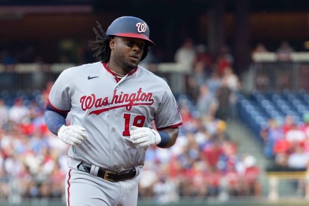 Josh Bell of the Washington Nationals rounds the bases after hitting a three run home run in the top of the first inning against the Philadelphia...