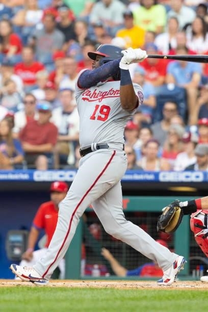 Josh Bell of the Washington Nationals hits a three run home run in the top of the first inning against the Philadelphia Phillies at Citizens Bank...
