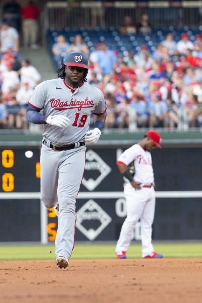 Josh Bell of the Washington Nationals rounds the bases after hitting a three run home run in the top of the first inning against the Philadelphia...
