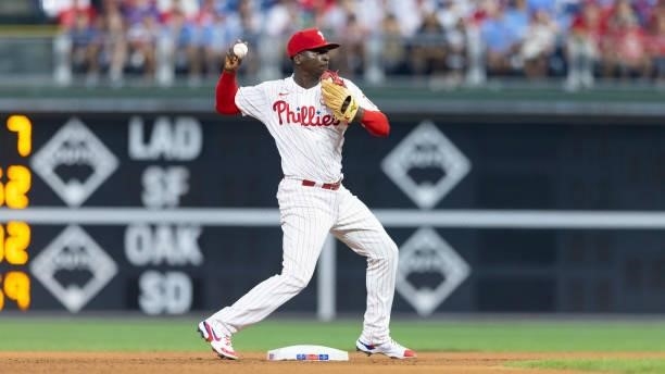 Didi Gregorius of the Philadelphia Phillies throws the ball to first base against the Washington Nationals at Citizens Bank Park on July 27, 2021 in...