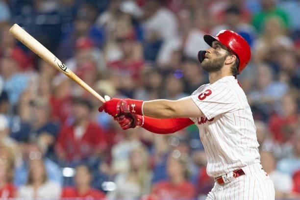 Bryce Harper of the Philadelphia Phillies hits an inside-the-park home run in the bottom of the fifth inning against the Washington Nationals at...