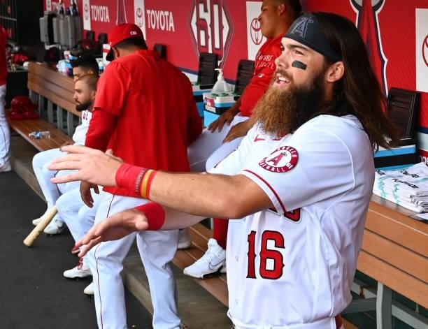 Brandon Marsh of the Los Angeles Angels stretches in the dugout before the game against the Colorado Rockies at Angel Stadium of Anaheim on July 26,...
