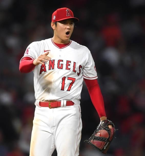 Shohei Ohtani of the Los Angeles Angels yells to first base during the game against the Colorado Rockies at Angel Stadium of Anaheim on July 26, 2021...