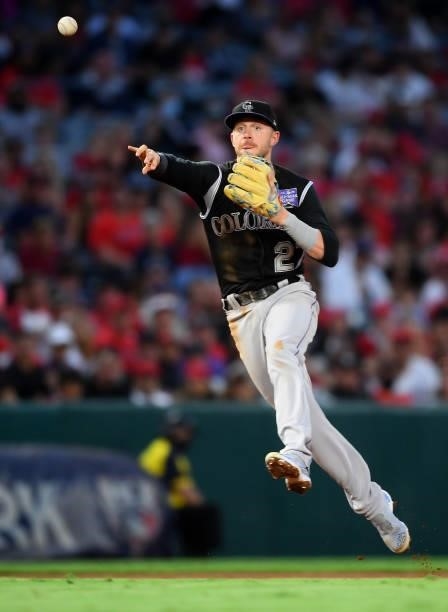 Trevor Story of the Colorado Rockies makes a play in the game against the Los Angeles Angels at Angel Stadium of Anaheim on July 26, 2021 in Anaheim,...