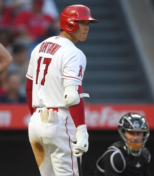 Shohei Ohtani of the Los Angeles Angels strikes out in the fifth inning of the game against the Colorado Rockies at Angel Stadium of Anaheim on July...