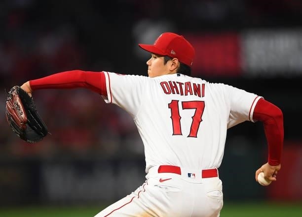 Shohei Ohtani of the Los Angeles Angels pitches in the game against the Colorado Rockies at Angel Stadium of Anaheim on July 26, 2021 in Anaheim,...