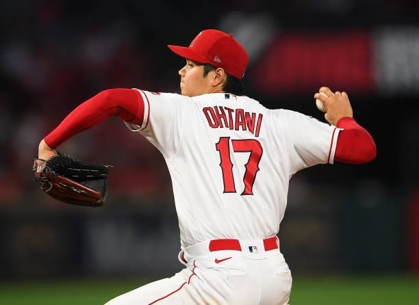 Shohei Ohtani of the Los Angeles Angels pitches in the game against the Colorado Rockies at Angel Stadium of Anaheim on July 26, 2021 in Anaheim,...