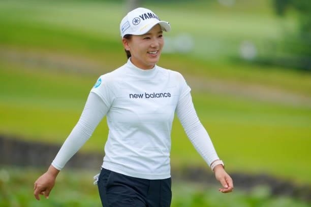 Chie Arimura of Japan smiles on the 18th green during the Pro-Am ahead of Rakuten Super Ladies at Tokyu Grand Oak Golf Club on July 28, 2021 in Kato,...