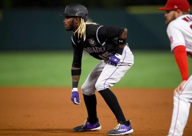 Raimel Tapia of the Colorado Rockies takes a lead off first base in the game against the Los Angeles Angels at Angel Stadium of Anaheim on July 26,...