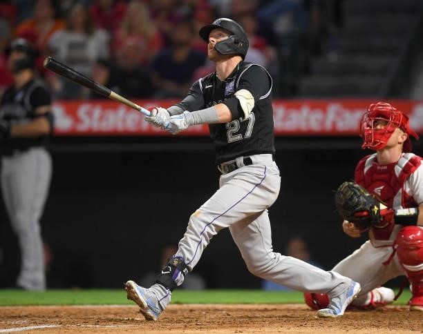 Trevor Story of the Colorado Rockies at bat in the game against the Los Angeles Angels at Angel Stadium of Anaheim on July 26, 2021 in Anaheim,...