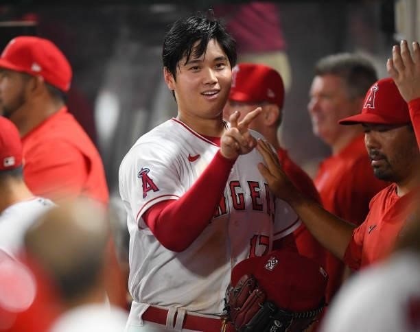 Shohei Ohtani of the Los Angeles Angels in the dugout after the sixth inning of the game against the Colorado Rockies at Angel Stadium of Anaheim on...