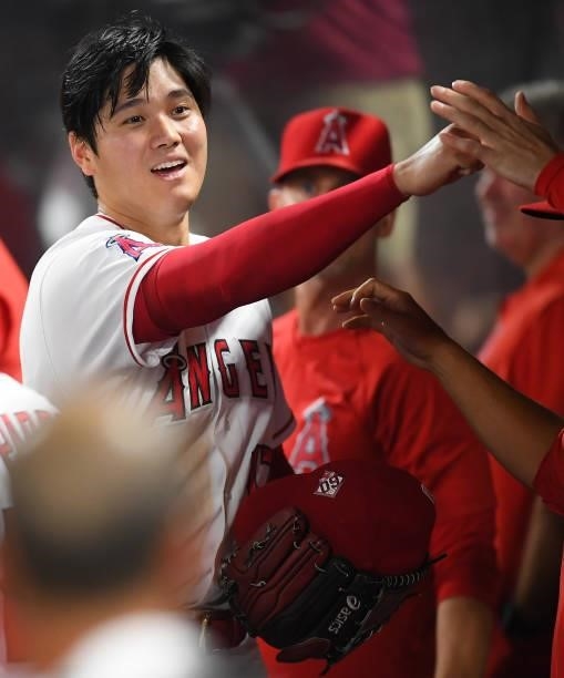 Shohei Ohtani of the Los Angeles Angels in the dugout after the sixth inning of the game against the Colorado Rockies at Angel Stadium of Anaheim on...