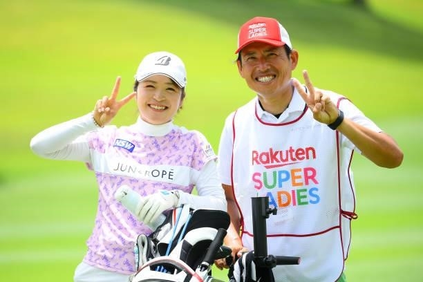 Kana Mikashima of Japan poses with her coach Sho Aoki during the Pro-Am ahead of Rakuten Super Ladies at Tokyu Grand Oak Golf Club on July 28, 2021...