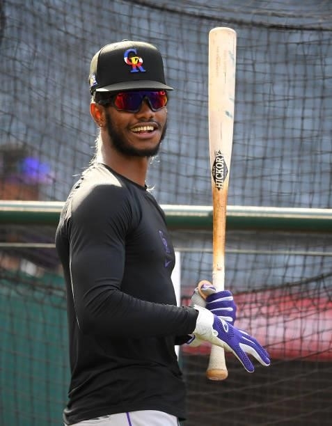 Raimel Tapia of the Colorado Rockies at the batting cage before the game against the Los Angeles Angels at Angel Stadium of Anaheim on July 26, 2021...