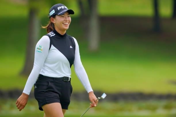 Hinako Shibuno of Japan smiles on the 18th green during the Pro-Am ahead of Rakuten Super Ladies at Tokyu Grand Oak Golf Club on July 28, 2021 in...