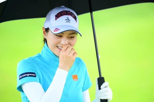 Hina Arakaki of Japan smiles after holing out on the 9th green during the Pro-Am ahead of Rakuten Super Ladies at Tokyu Grand Oak Golf Club on July...