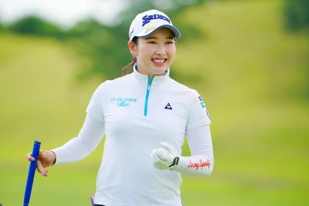 Sakura Koiwai of Japan smiles after holing out on the 18th green during the Pro-Am ahead of Rakuten Super Ladies at Tokyu Grand Oak Golf Club on July...