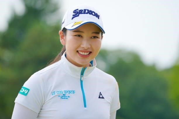 Sakura Koiwai of Japan smiles after holing out on the 18th green during the Pro-Am ahead of Rakuten Super Ladies at Tokyu Grand Oak Golf Club on July...
