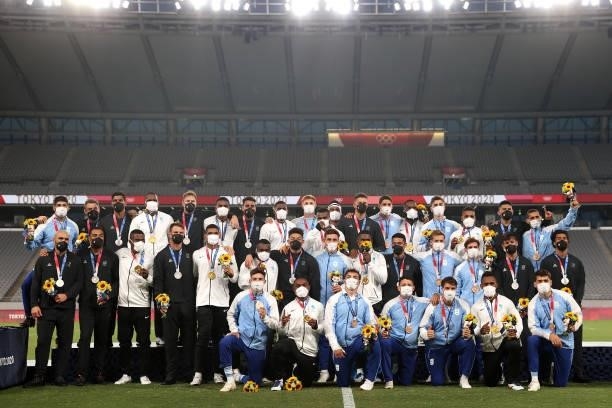 Team Fiji, Team New Zealand and Team Argentina pose together for photos on day five of the Tokyo 2020 Olympic Games at Tokyo Stadium on July 28, 2021...