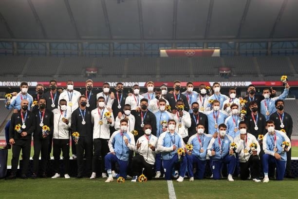 Team Fiji, Team New Zealand and Team Argentina pose together for photos on day five of the Tokyo 2020 Olympic Games at Tokyo Stadium on July 28, 2021...