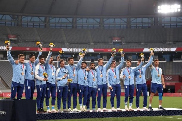 Team Argentina pose with bronze medals after winning the Rugby Sevens Men's Bronze Medal match between Great Britain and Argentina on day five of the...