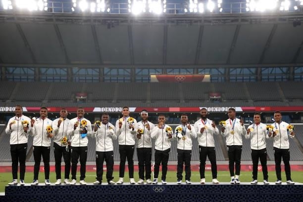 Team Fiji pose with gold medals after winning the Rugby Sevens Men's Gold Medal match between New Zealand and Fiji on day five of the Tokyo 2020...