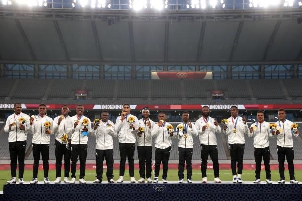 Team Fiji pose with gold medals after winning the Rugby Sevens Men's Gold Medal match between New Zealand and Fiji on day five of the Tokyo 2020...
