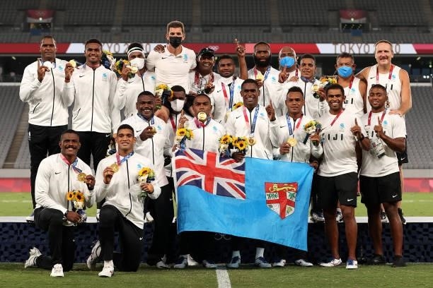 Team Fiji pose with their gold medals after winning the Rugby Sevens Men's Gold Medal match between New Zealand and Fiji on day five of the Tokyo...