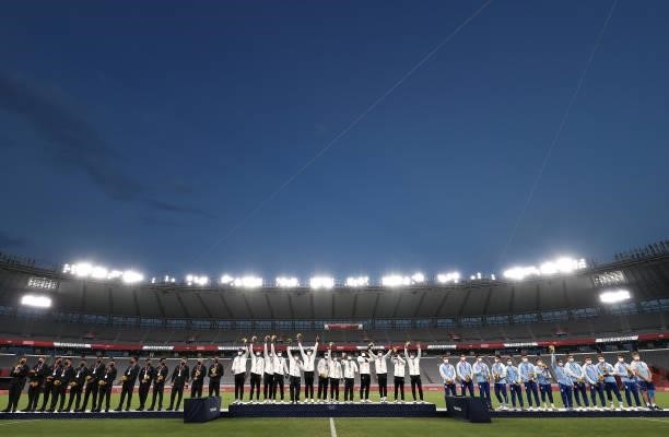 Team New Zealand, Team Fiji and Team Argentina pose on day five of the Tokyo 2020 Olympic Games at Tokyo Stadium on July 28, 2021 in Chofu, Tokyo,...