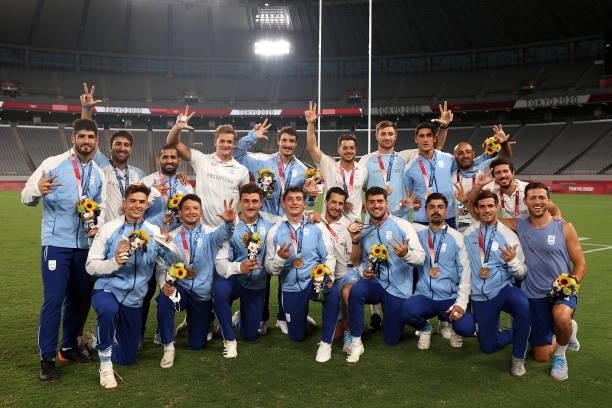 Team Argentina pose for photographs with their bronze medals on day five of the Tokyo 2020 Olympic Games at Tokyo Stadium on July 28, 2021 in Chofu,...